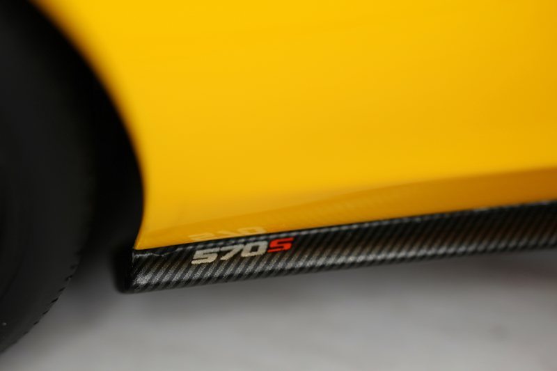 Illustration for article titled TopSpeed's Volcano Yellow McLaren 570s